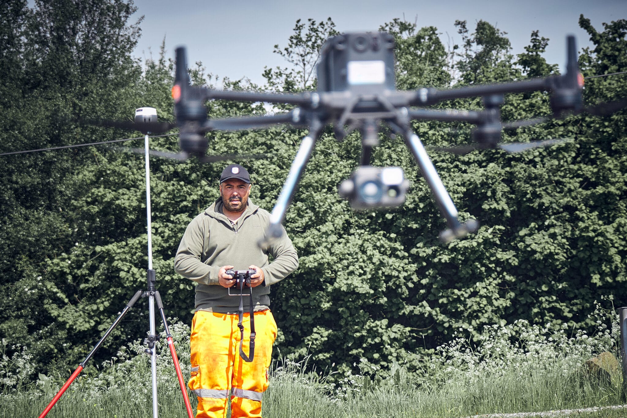 Paul Harty carrying out UAV survey work with GNSS equipment on site
